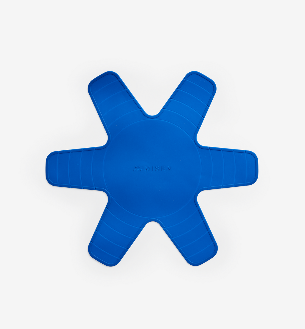 Misen blue silicone pan protector with six-pointed star shape